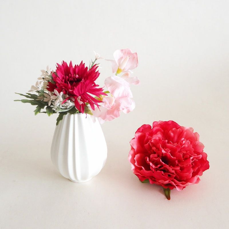 一輪差しにぴったりのお花を主にセットにしています（一輪差し