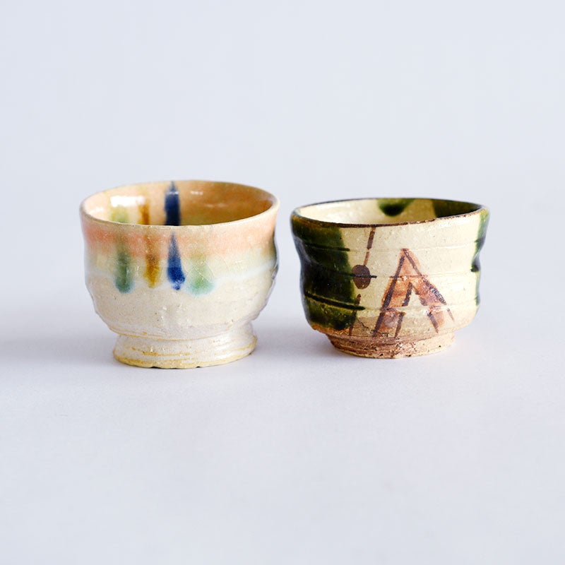 美濃焼の代表的な技法である「織部」と、温かみのある「志野」の趣を持つぐい呑みペアです